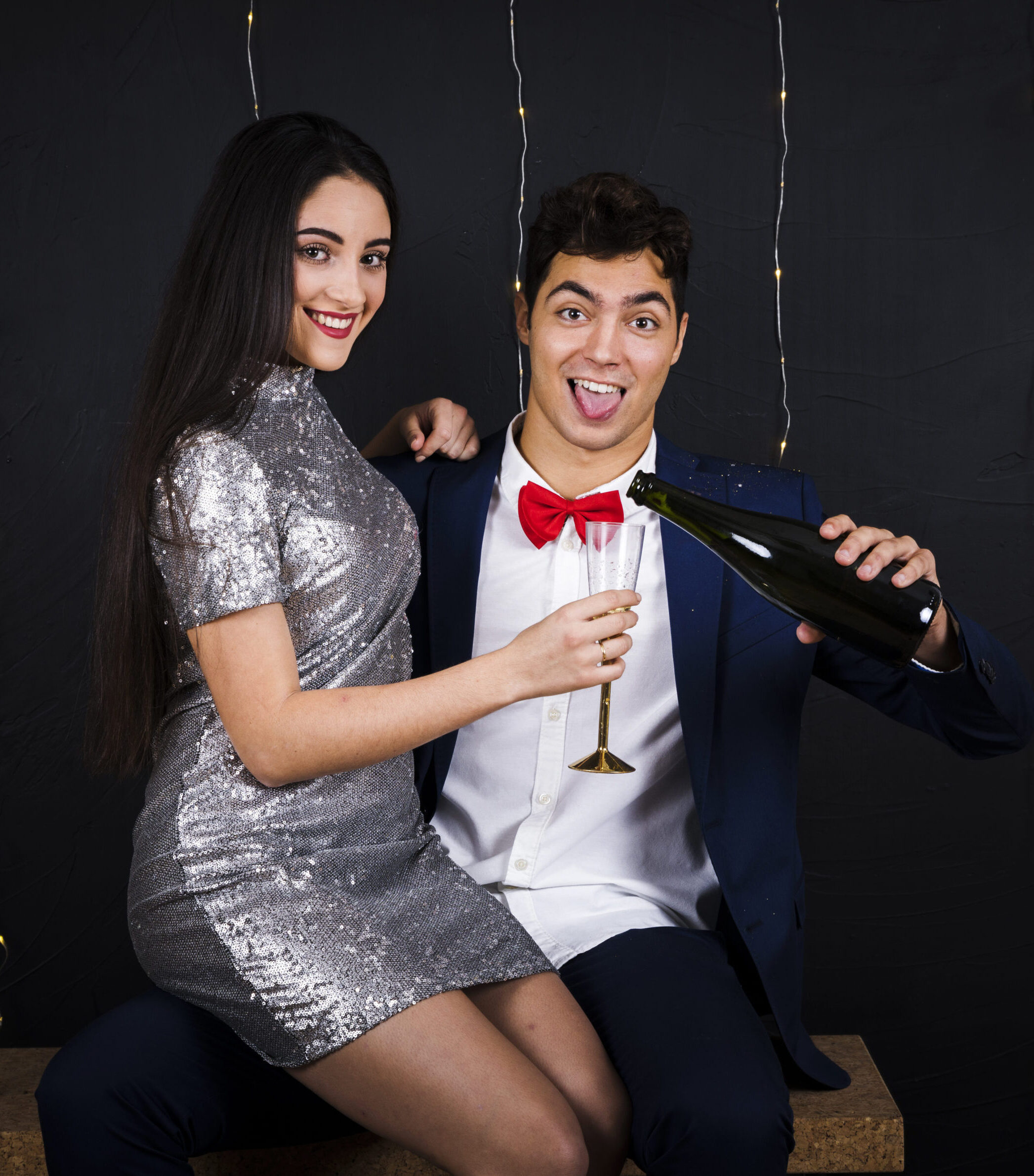 funny-man-with-bottle-sitting-with-woman-with-glass